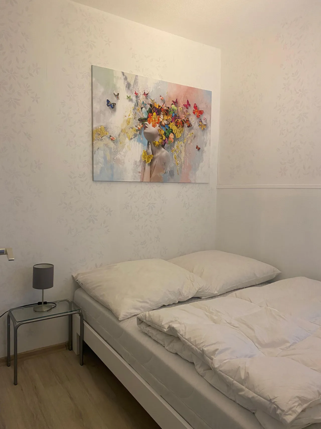 Schlafzimmer mit Wandbild – BergQuartier in Hahnenklee