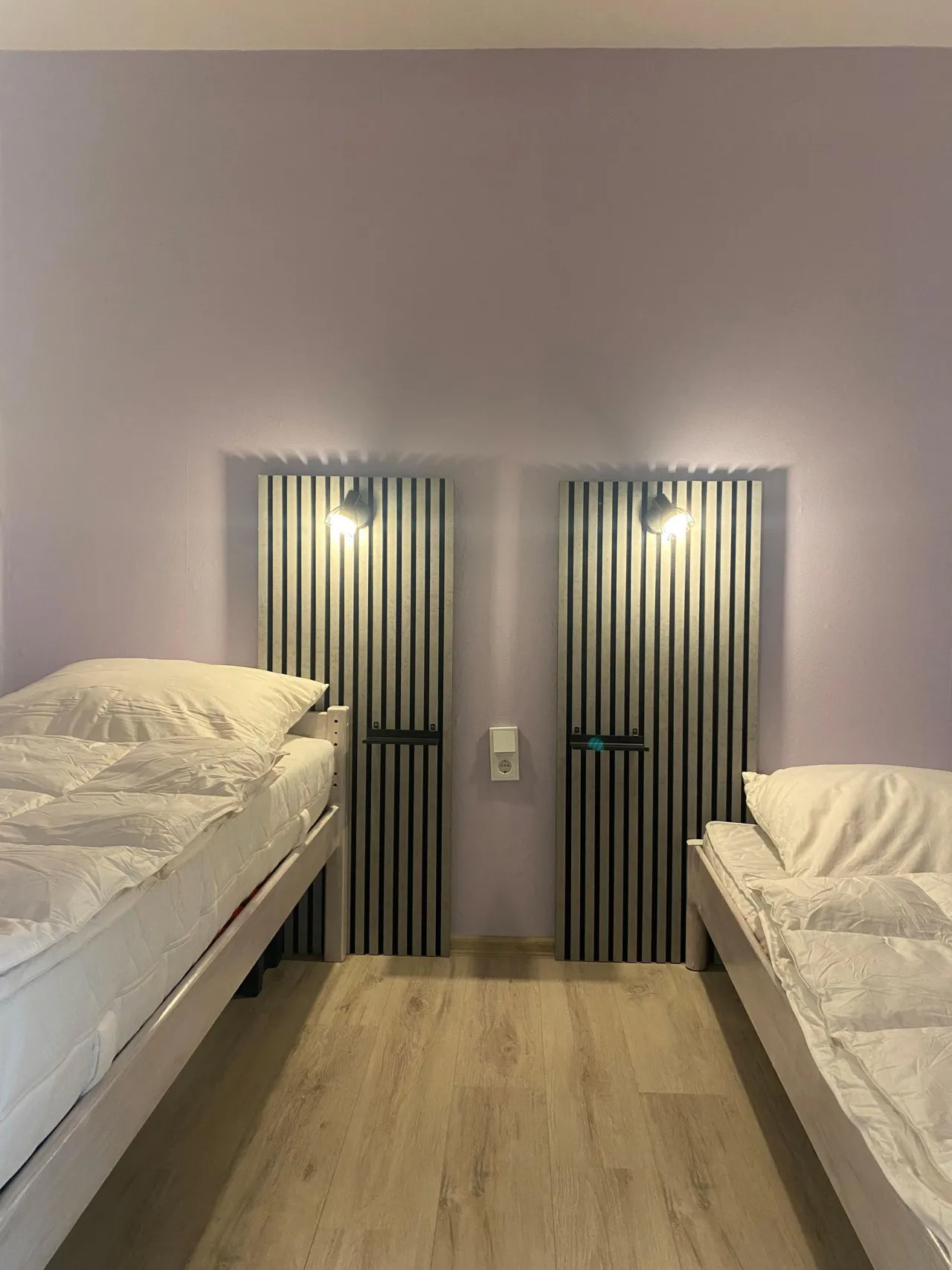 Schlafzimmer mit zwei Einzelbetten – BergQuartier in Hahnenklee