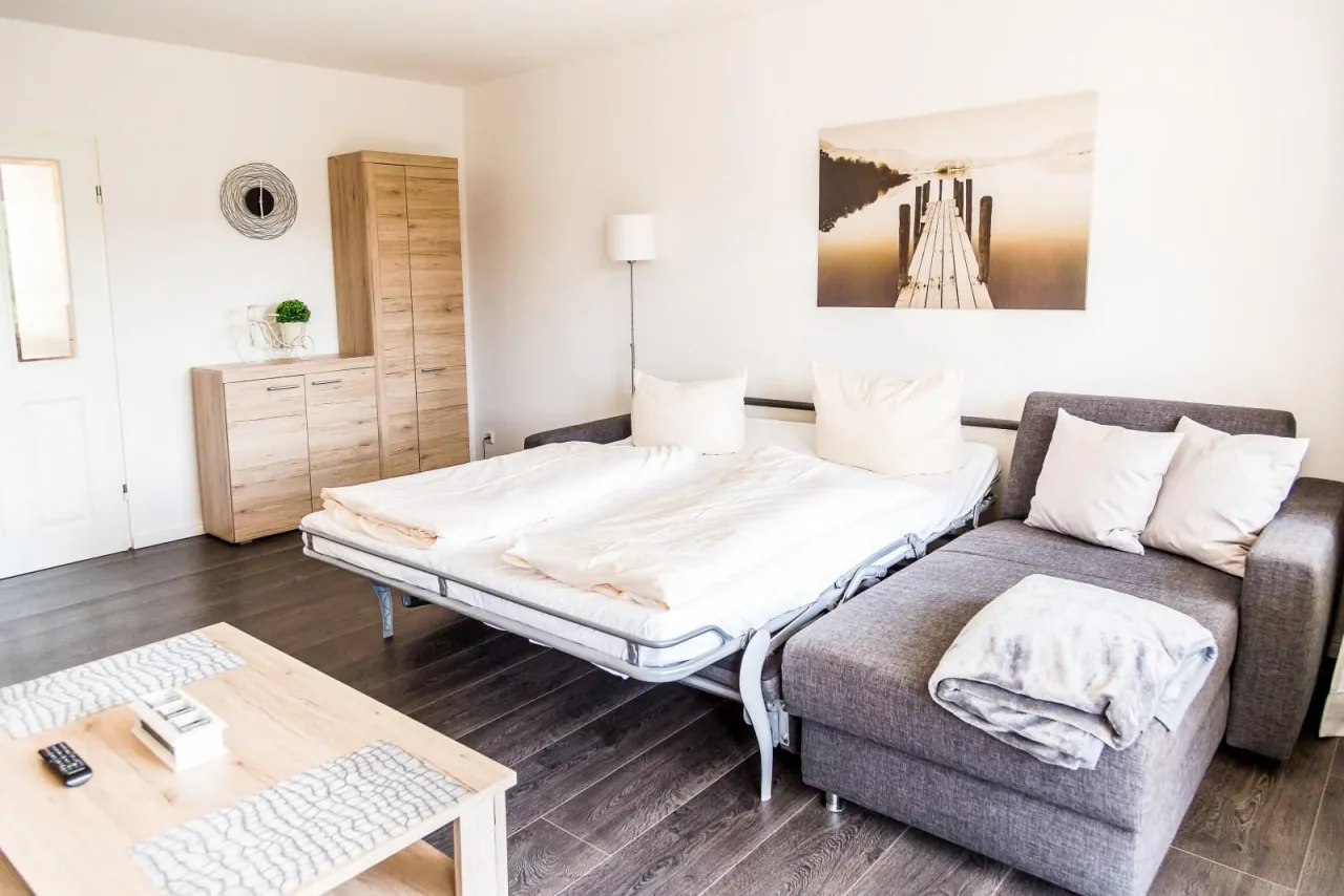 Wohnraum mit ausgezogenem Schlafsofa – Fewo Petra in Hahnenklee